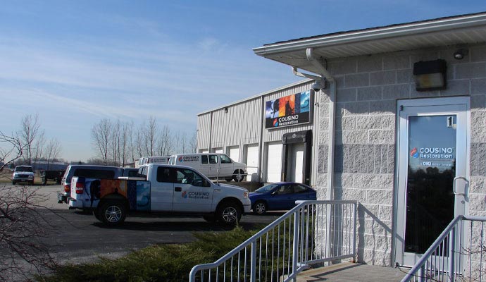 Cousino Restoration & Environmental office and service vehicles